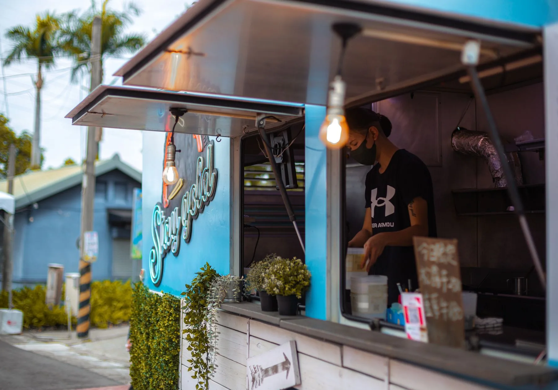 Modern food stall serving guests from a clean and inviting food truck